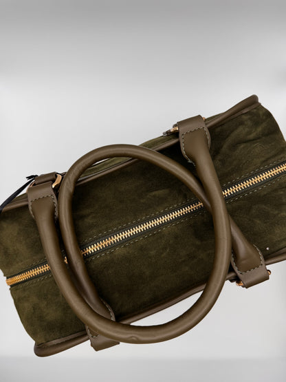 Le sac porté main rétro aspect velours