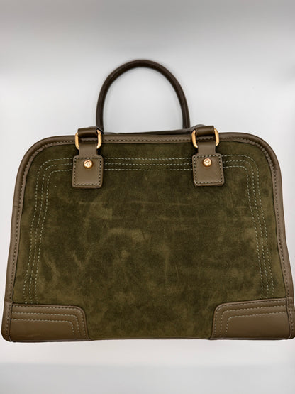 Le sac porté main rétro aspect velours