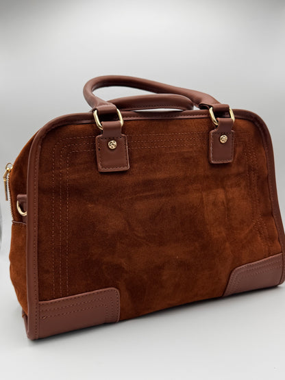 Le sac porté main rétro aspect velours