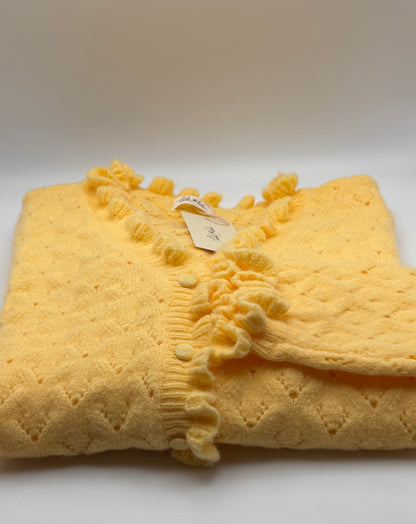 Le gilet ajouré à froufrou Antoinette